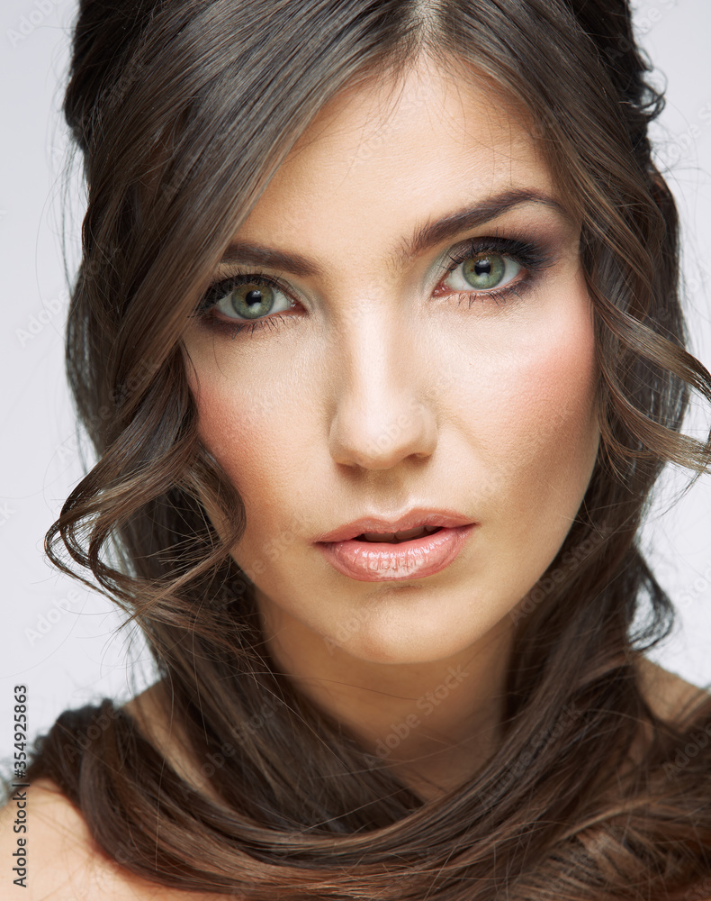 Naklejka premium young woman with long curly hair