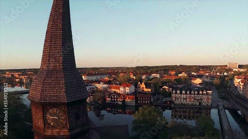 Church in the Rapid (Fors Kyrka) and Eskilstuna city from air. Aerial shoot of Rapid (Fors Kyrka) and Eskilstuna city in Sweden photo