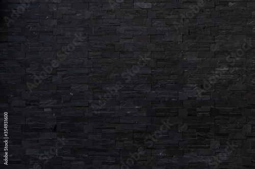 Abstract Dark Black brick wall texture for background. Brickwork background for Interior. 