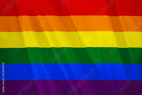 LGBT wave rainbow flag for symbol of pride month social movement rainbow flag is a symbol of lesbian  gay  bisexual  transgender  human rights  tolerance and peace.