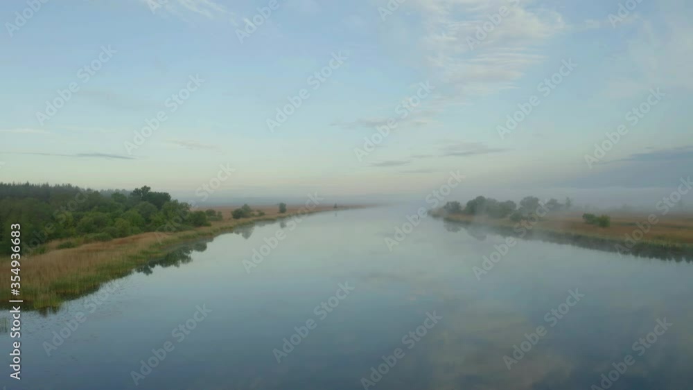 Beautiful view of river in morning, slow motion effect. Drone video recording Beautiful view of river in morning, slow motion effect. Drone video recording