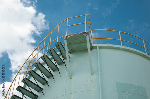 stairway to sky iron staircase beside the water tank 