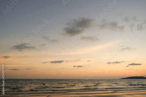 Sunset beautiful golden yellow. Beach, sea, sandy beach. On twilight. © Wattanadach