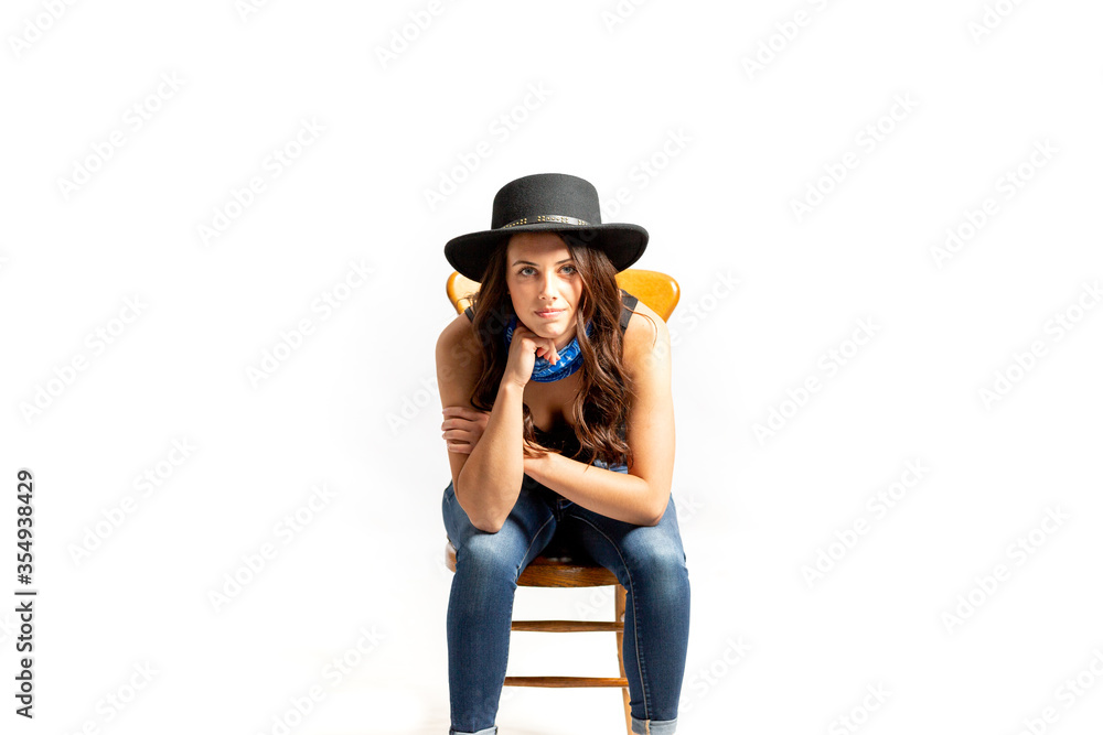 Beautiful Young Model posing in dress and hat on white background
Beautiful Young Model posing in dress and hat on white background