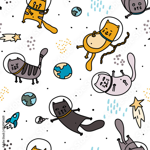 Cats in space seamless pattern. Doodle hand drawn scandinavian childish background