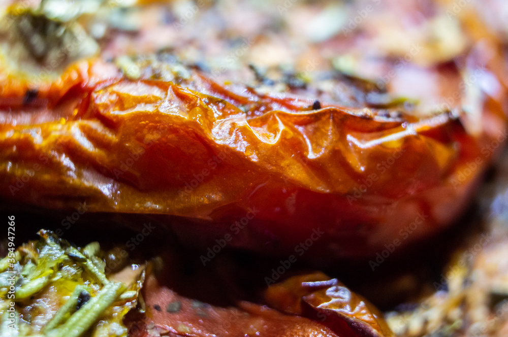 Sun-dried Italian tomatoes with seasoning closeup. Macro photography Sun-dried Italian tomatoes with seasoning closeup. Macro photography