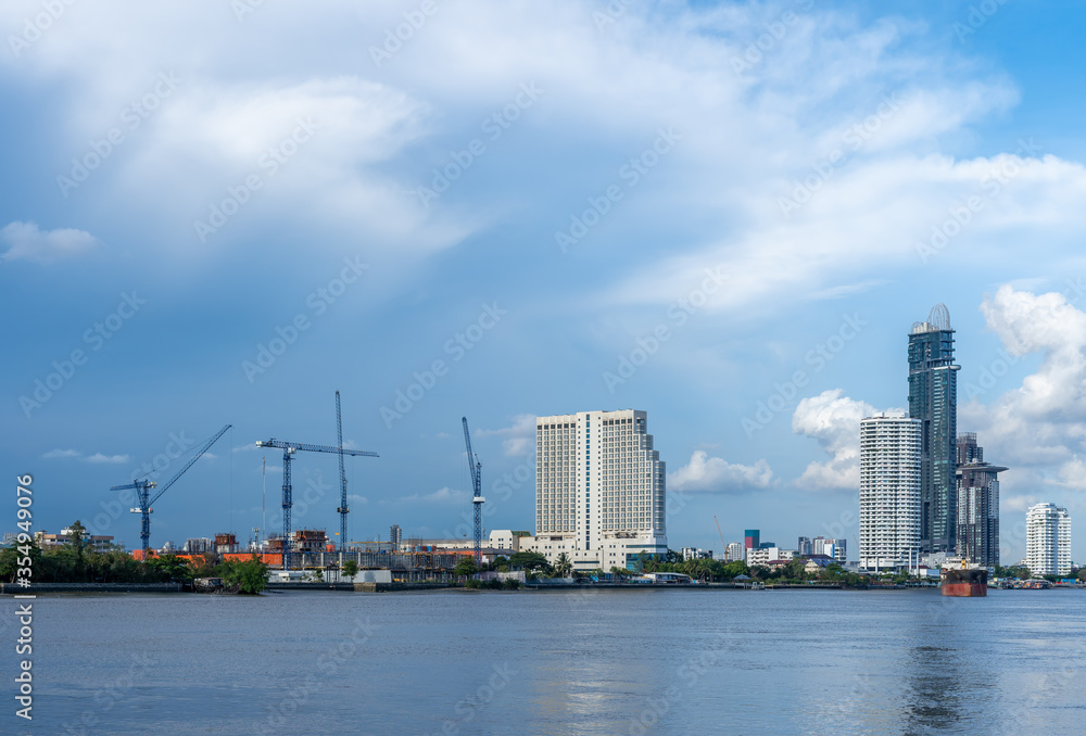 Views of the Chao Phraya River, Bangkok, Thailand overlooking the apartment and boat on a clear day. Views of the Chao Phraya River, Bangkok, Thailand overlooking the apartment and boat on a clear day.