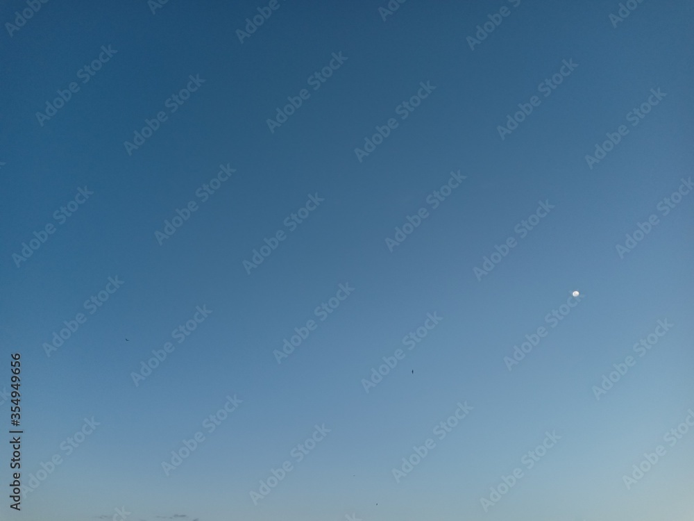 Fototapeta premium white and black clouds were seen late into the