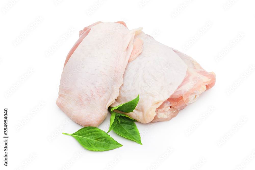 Fresh chicken meat with green leaf on white background. Commercial image of raw food isolated with clipping path.