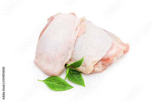 Fresh chicken meat with green leaf on white background. Commercial image of raw food isolated with clipping path.