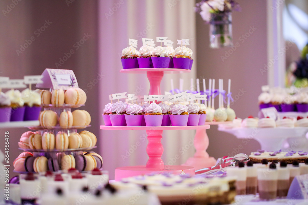 delicious candy bar with various sweets. cake pops, cupcakes, macaroons and others delicious candy bar with various sweets. cake pops, cupcakes, macaroons and others