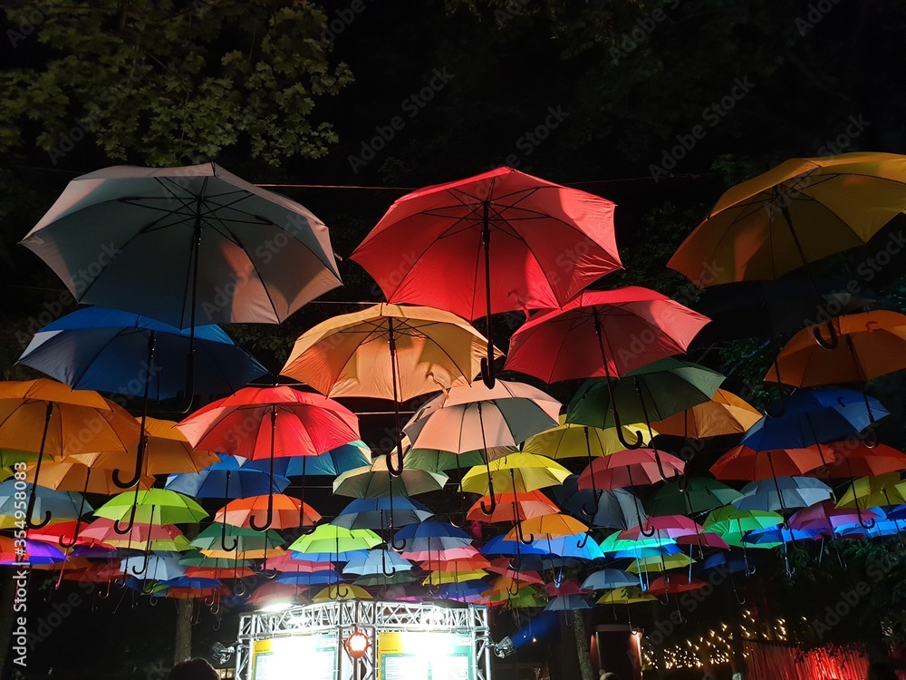 Decoration with colorful umbrellas at night