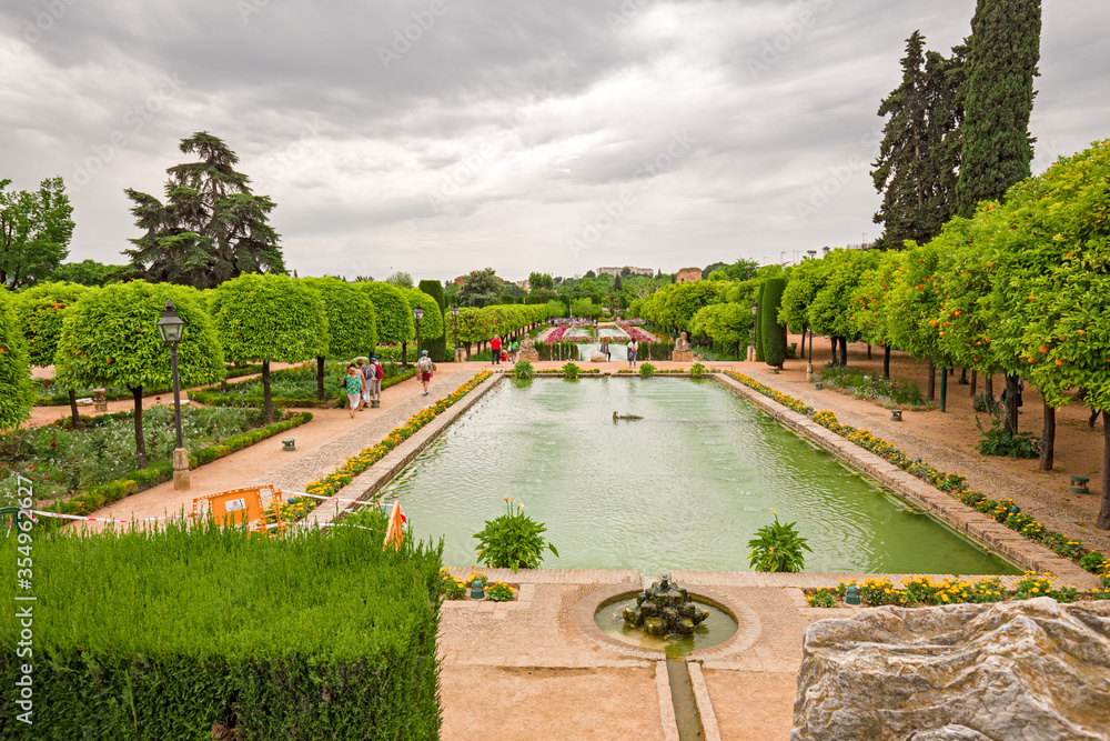 View of the flowery gardens of the Alcázar de los Reyes Cristianos in Cordoba, Spain.