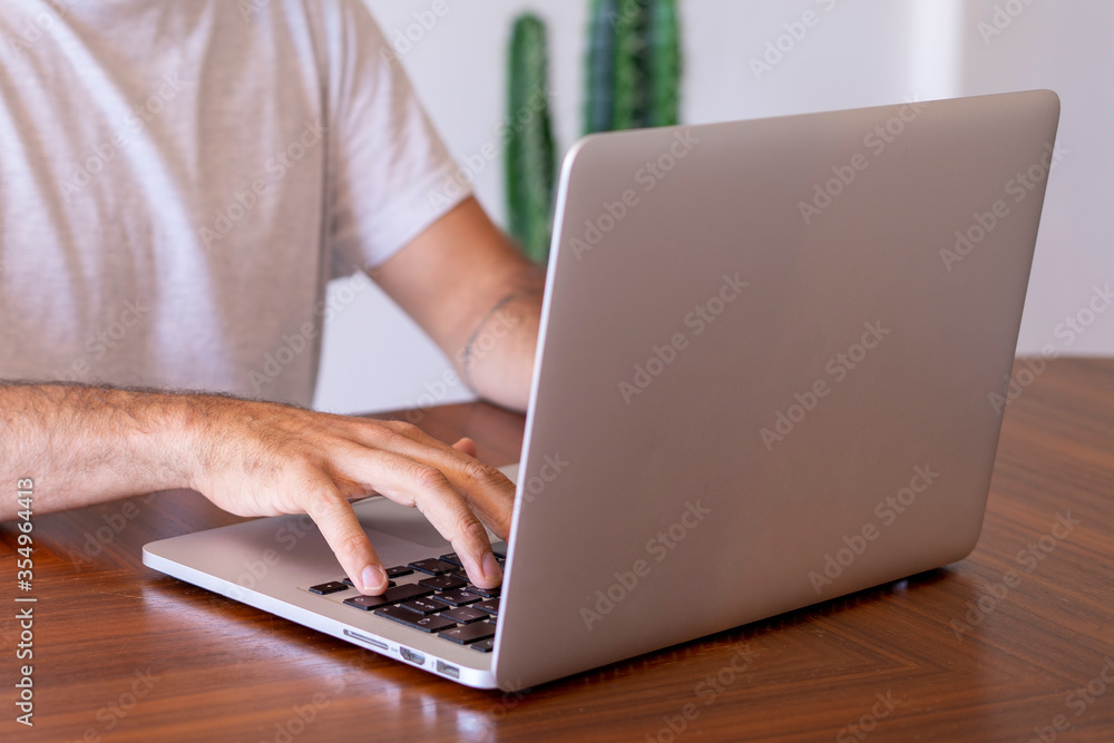 Man typing on the computer Man typing on the computer