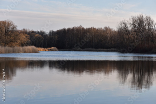Peterhof. View of the banks of the Ruin Pond, created by order of Tsar Nicholas I, in the last rays of the setting sun.
