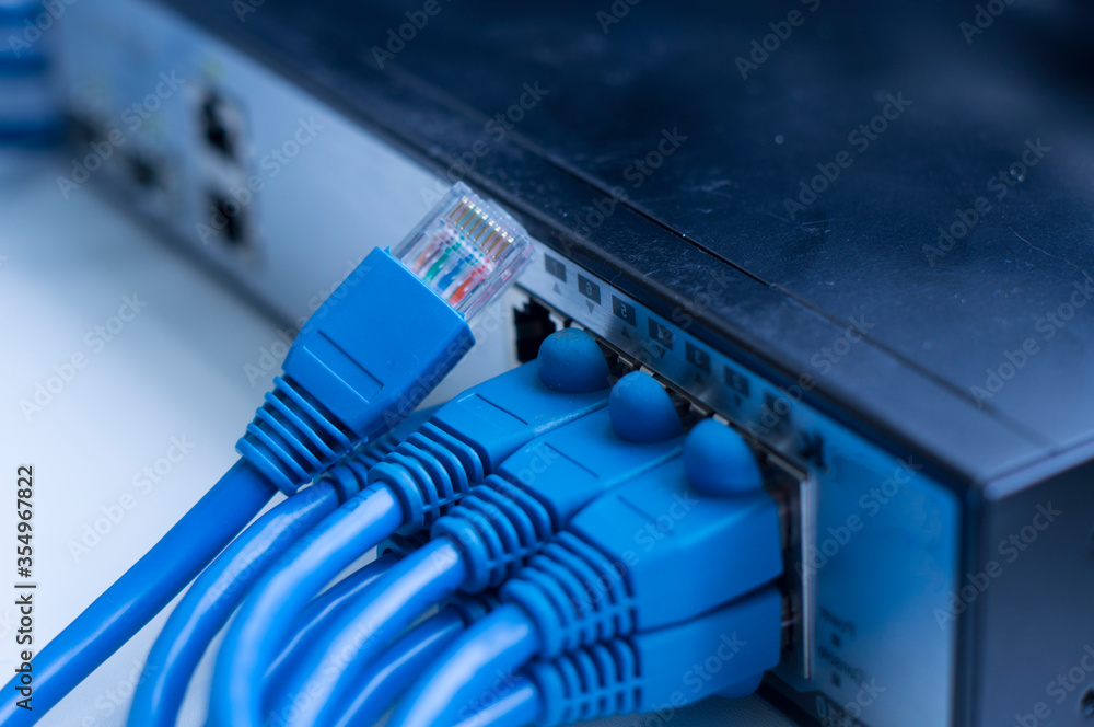 Cable and connectors for Internet connection. Details in telecommunications. Small details of great technology. RJ-45. Ethernet cable. Cable and connectors for Internet connection. Details in telecommunications. Small details of great technology. RJ-45. Ethernet cable.