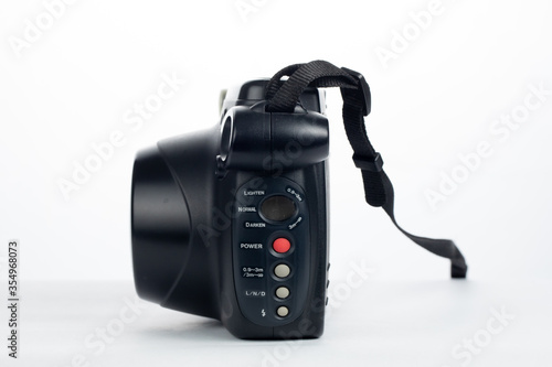 side view of instant film camera isolated on white background