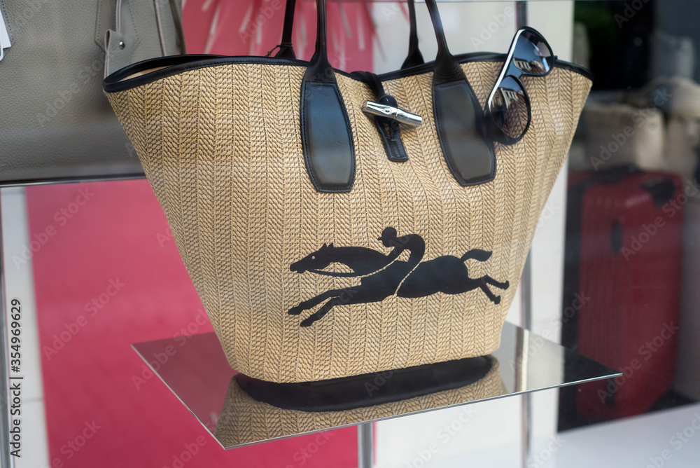 Mulhouse - France - 2 June 2020 - Closeup of summer handbag by longchamp in  a luxury fashion store showroom Stock Photo | Adobe Stock