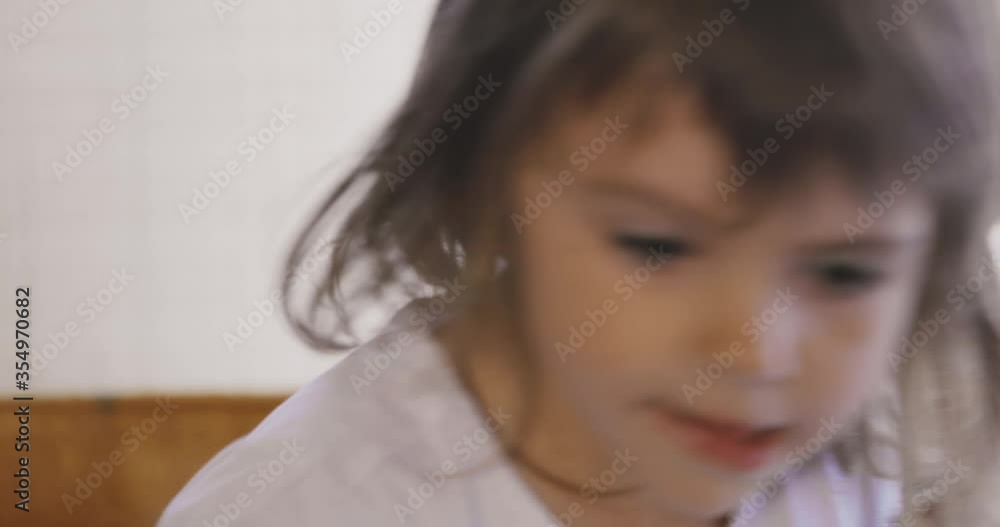 Adorable little girl licking ice cream Adorable little girl licking ice cream