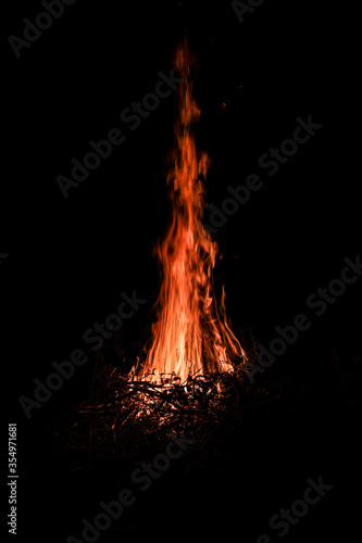 Camp fire burning in the night