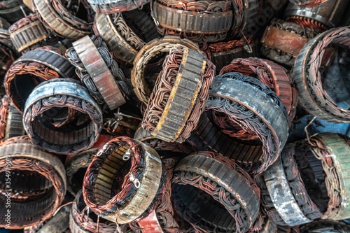 stator plate and wingdings in ac alternators for recycling. copper recycling from stator. photo