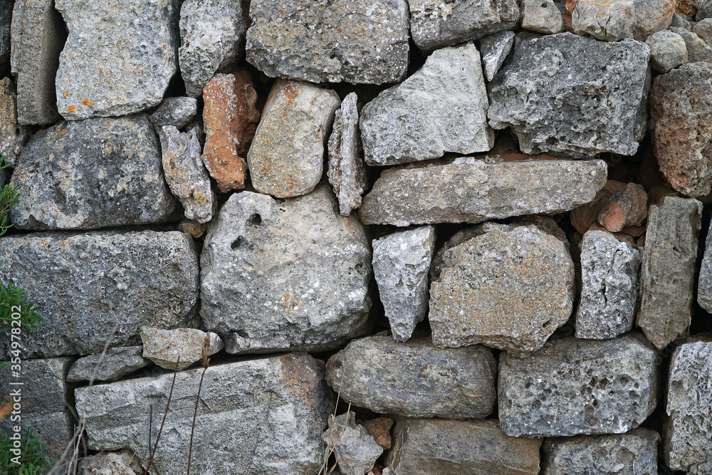 Stone wall background forming an abstract pattern Stone wall background forming an abstract pattern