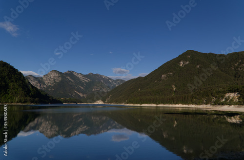The beautiful morning landscape of the Redona Lake, Italy