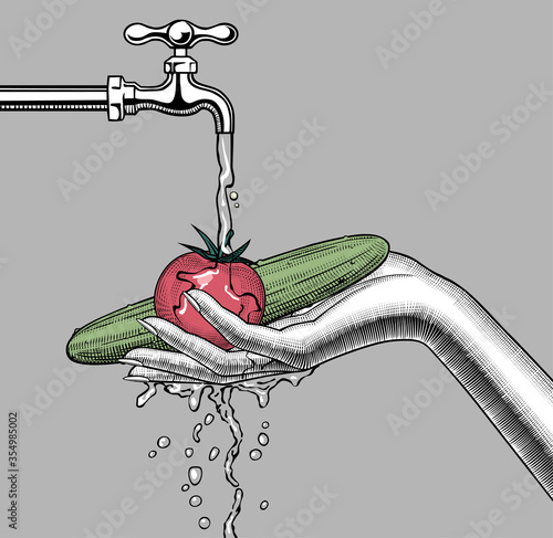 Female hand washes vegetables under the water tap