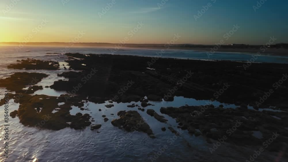 Unusual aerial morning scene at low tide time on Quebrado's Beach, Peniche, Portugal. Unusual aerial morning scene at low tide time on Quebrado's Beach, Peniche, Portugal.