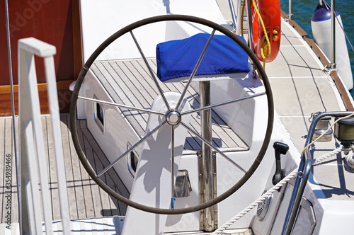A steering wheel on a boat © AVD