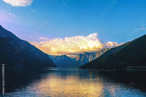Fototapeta Naklejka Na Ścianę i Meble -  Beautiful view of the Norwegian mountains and fjord water on a Sunny day