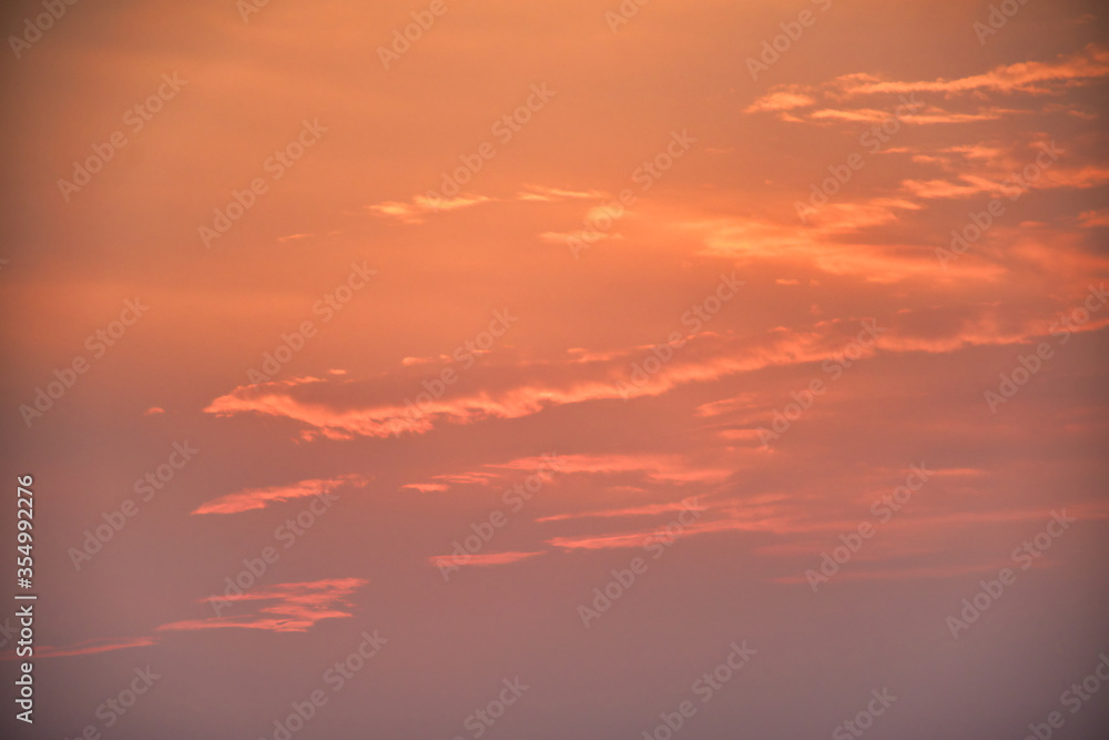 Sky with clouds during a golden sunset