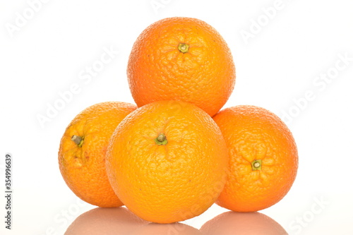 Ripe, organic orange, macro, on a white background.