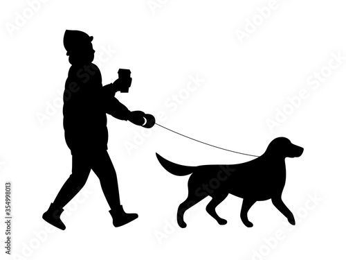 Silhouette of a girl and a dog in side view.