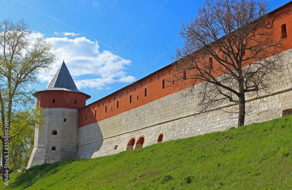 The exterior of the Kremlin wall in Zaraysk town. Cultural heritage of the Middle Ages (16th century) in the Moscow region, Russia. The exterior of the Kremlin wall in Zaraysk town. Cultural heritage of the Middle Ages (16th century) in the Moscow region, Russia.