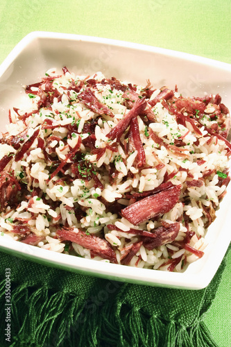 carreteiro rice, with shredded dried meat and herbs photo