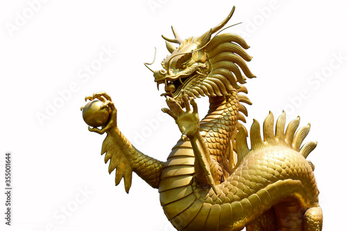 Chinese golden dragon isolated on white background. Golden traditional chinese dragon isolated on white background. Feng Shui statuette.