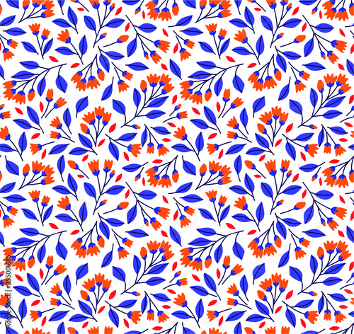 Floral pattern. Pretty flowers on white background. Printing with small orange flowers. Ditsy print. Seamless vector texture. Spring bouquet.