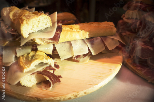 Serrano ham and cheese sandwiches stacked photo