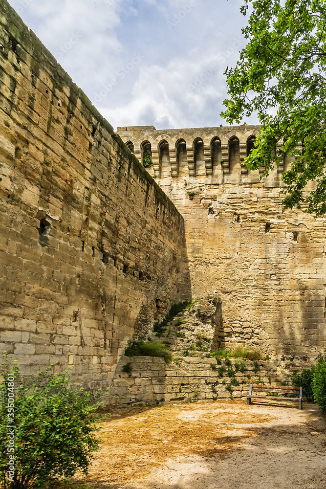 City Walls - ramparts of ancient fortresses that were built between 1359 and 1370 that are still intact. The walls were constructed to keep invaders out during Middle Ages. Avignon, Provence, France.