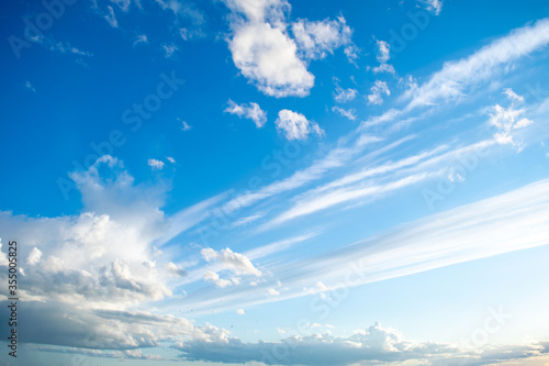 Cuadro en lienzo white clouds in the blue sky before sunset