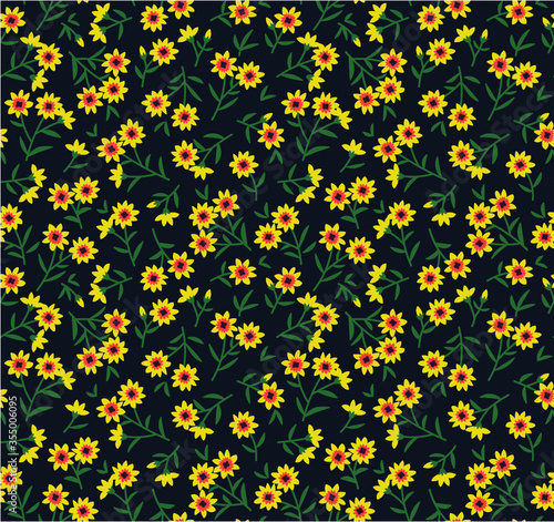 Vintage floral background. Seamless vector pattern for design and fashion prints. Flowers pattern with small yellow flowers on a dark blue background. Ditsy style. 