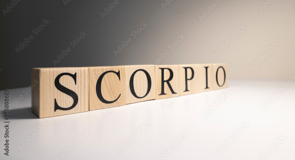 Scorpio word on wooden cubes on white background. Scorpio word on wooden cubes on white background.