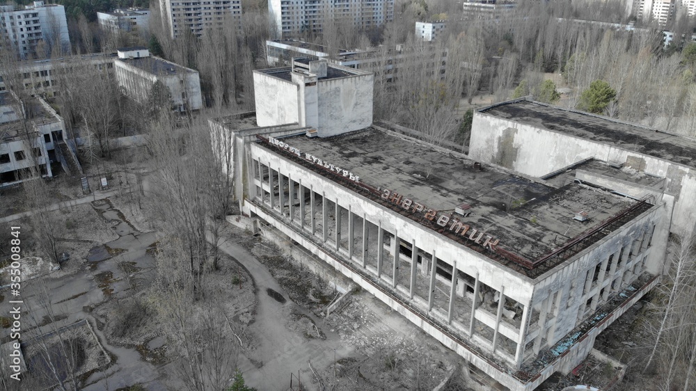 Pripyat aerial panorama cityview. . Drone flies over the deserted abandoned city of Pripyat, Ukraine. Exclusion zone near the Chernobyl nuclear power plant. Pripyat aerial panorama cityview. . Drone flies over the deserted abandoned city of Pripyat, Ukraine. Exclusion zone near the Chernobyl nuclear power plant.