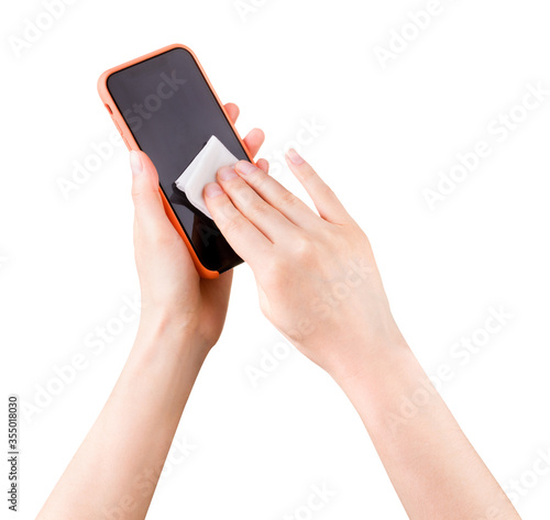 Woman hand clean mobile phone by wet wipe isolated on white background
