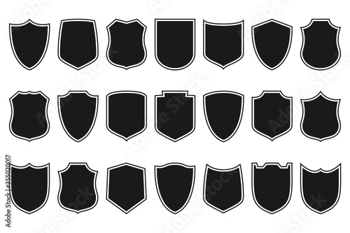 Shields set. Collection of security shield icons with contours. Design elements for concept of safety and protection. Vector illustration.