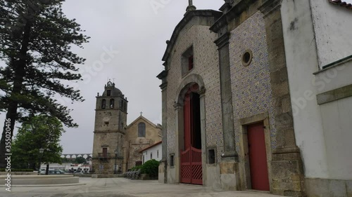 Vasco da Gama Square, Vila do Conde’s Matrice Church (Mother Church, Igreja Matriz), dedicated to St. John the Baptist and the Chapel of Our Lord of Agony, Vila do Conde, Portugal. photo