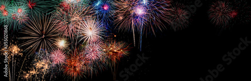Colorful holiday festival celebration fireworks in Happy New Year 2025 with blank copy space for banner.