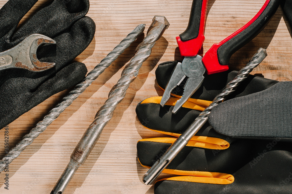 Building tools including centimeter ruler, wrench and cutter placed in ...