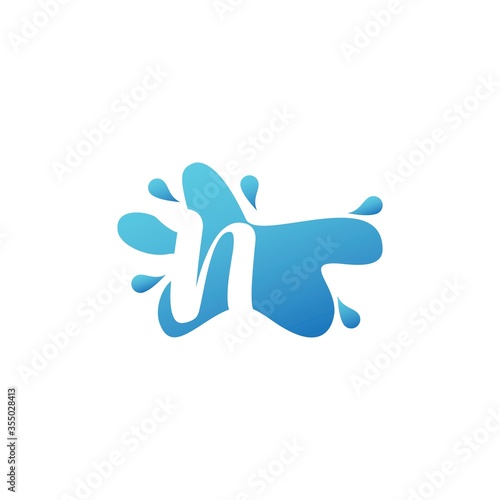 Negative Space N letter logo icon in water splash shape vector design template